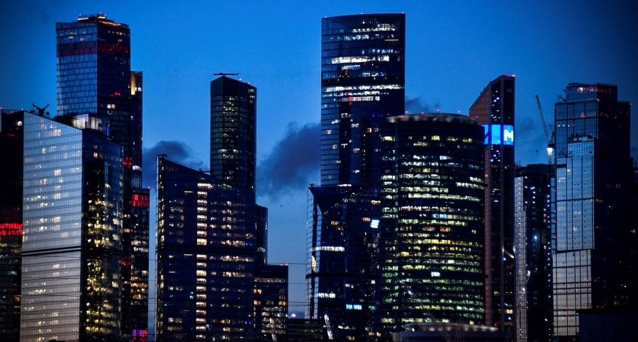 A picture taken on 27 May 2022 shows a view of the towers of the International Business Centre (Moskva City) in western Moscow. Russia's central bank cuts its key interest rate following an emergency meeting, as authorities seek to rein in the ruble which has surged in value despite the conflict in Ukraine. (Alexander Nemenov/AFP)