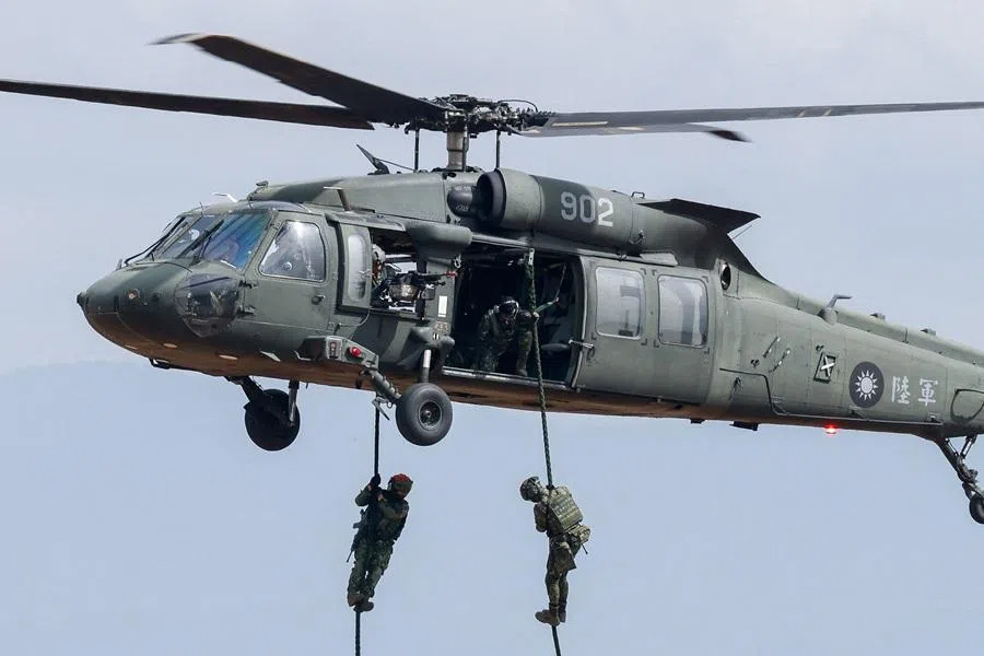 Soldiers rappel from a UH-60 Black Hawk helicopter during an annual military exercise ahead of Lunar New Year in Taichung, Taiwan, on 27 January 2026. (Ann Wang/Reuters)