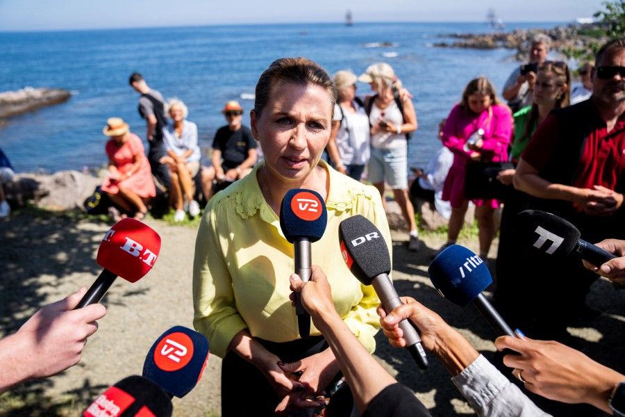 Chairman of the Danish Social Democratic Party and Danish Prime Minister, Mette Frederiksen speaks to journalists at the democratic event Folkemoedet (The People's Meeting) in Allinge, Bornholm, Denmark, 16 June 2023. (Ida Marie Odgaard/ Ritzau Scanpix/ via Reuters)
