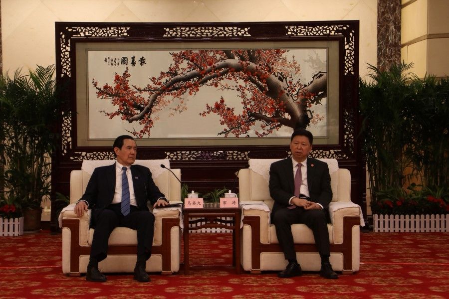 Former Taiwan President Ma Ying-jeou (left) meets the head of China's Taiwan Affairs Office of the State Council Song Tao, in Wuhan, Hubei province, China, in this handout picture released 30 March 2023. (Ma Ying-jeou's Office/Handout via Reuters)