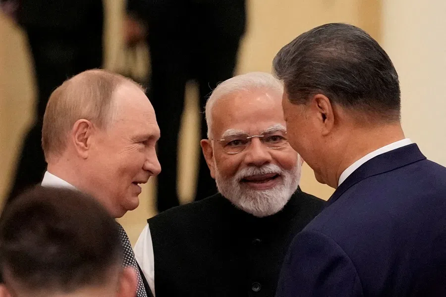 Indian Prime Minister Narendra Modi talks with Russian President Vladimir Putin and Chinese President Xi Jinping ahead of the Shanghai Cooperation Organization Summit 2025 at the Meijiang Convention and Exhibition Centre in Tianjin, China, on 1 September 2025.