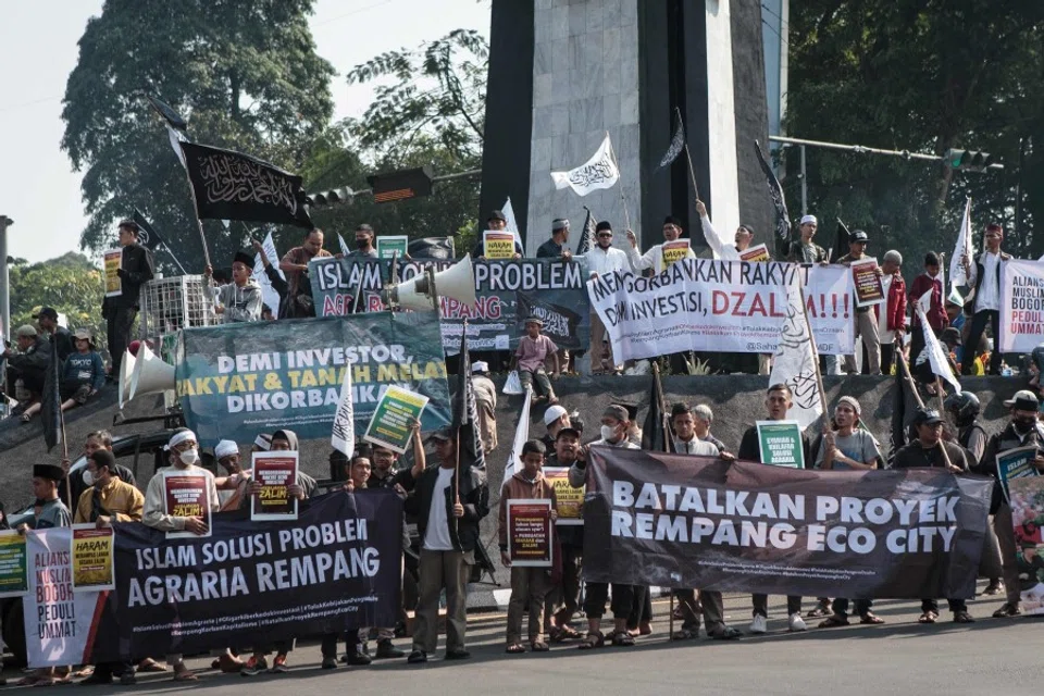 Members of the Muslim community protest against a government plan to develop the Rempang Island into a Chinese-funded economic zone that would displace around 7,500 people, near the Presidential Palace in Bogor on 24 September 2023. (Aditya Aji/AFP)
