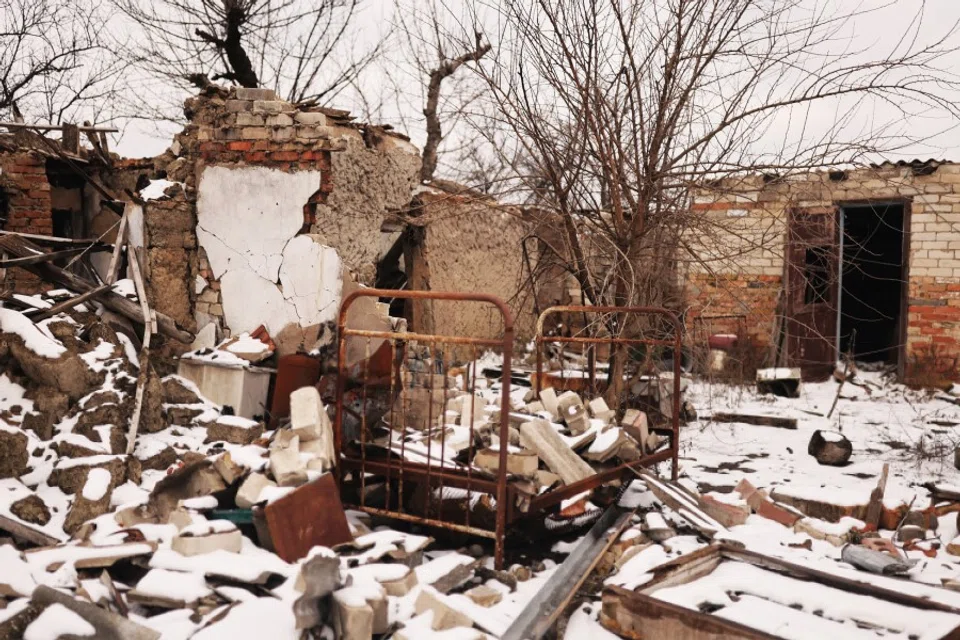 A bed is pictured in a house destroyed during the months of Russian occupation in the village of Posad-Pokrovske, amid Russia's invasion of Ukraine, northwest of the city of Kherson, Ukraine, 30 January 2023. (Nacho Doce/Reuters)