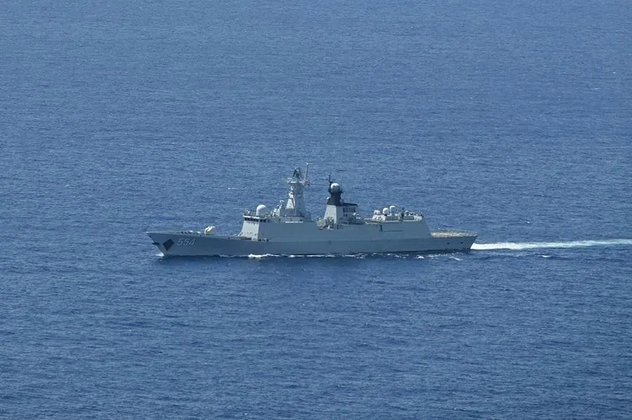 A ship identified by the Philippine Coast Guard as a Chinese Navy vessel is seen near Scarborough Shoal in the disputed South China Sea on 15 June 2026.