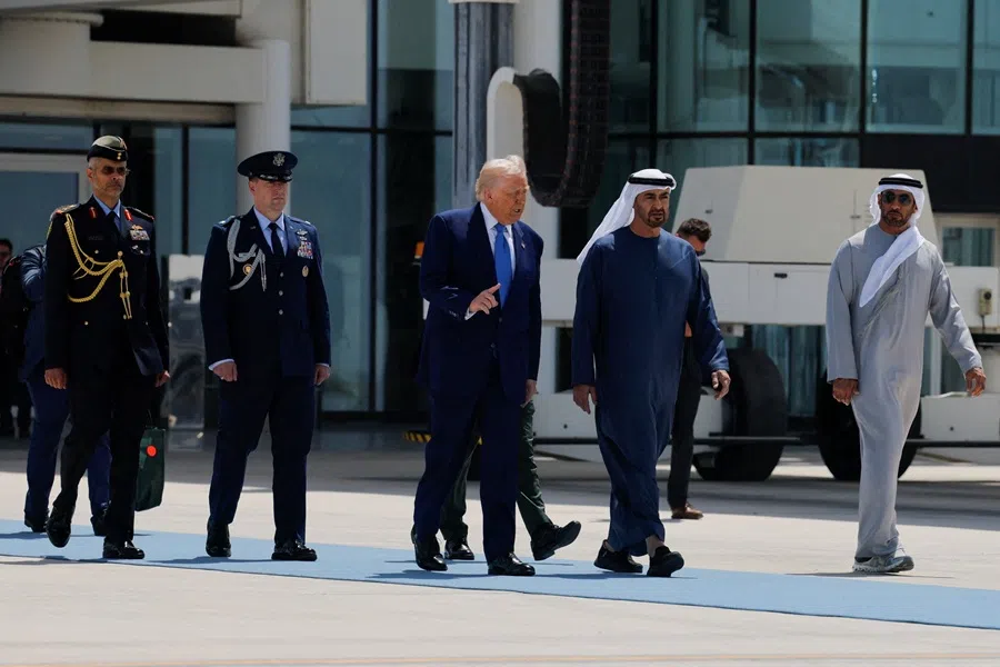 United Arab Emirates President Sheikh Mohamed bin Zayed Al Nahyan accompanies US President Donald Trump as he departs Abu Dhabi, United Arab Emirates, on 16 May 2025. (Brian Snyder/Reuters)