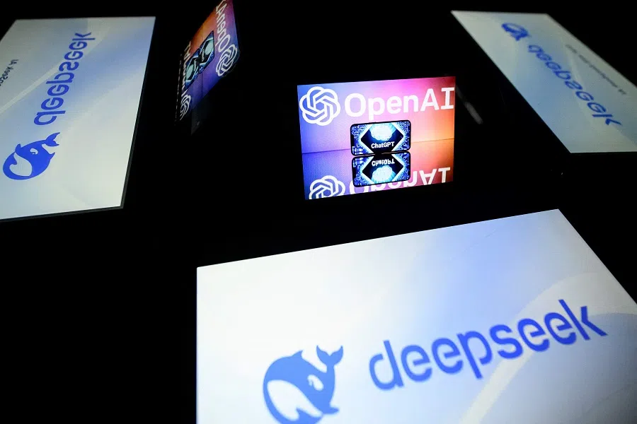This illustration photograph shows screens displaying the logo of DeepSeek, a Chinese AI company that develops open-source large language models, and the logo of OpenAI’s AI chatbot ChatGPT. (Lionel Bonaventure/AFP)