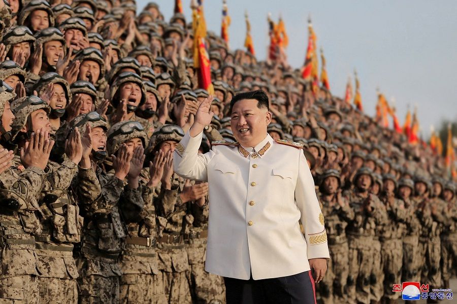 North Korean leader Kim Jong-un meets troops who have taken part in the military parade to mark the 90th anniversary of the founding of the Korean People's Revolutionary Army, in this undated photo released by North Korea's Korean Central News Agency (KCNA), 29 April 2022. (KCNA via Reuters)