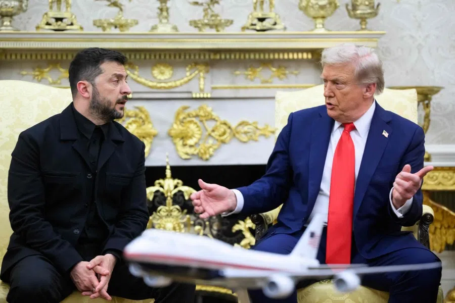 Ukrainian President Volodymyr Zelenskyy and US President Donald Trump participate in a meeting in the Oval Office of the White House in Washington, DC, on 18 August 2025.