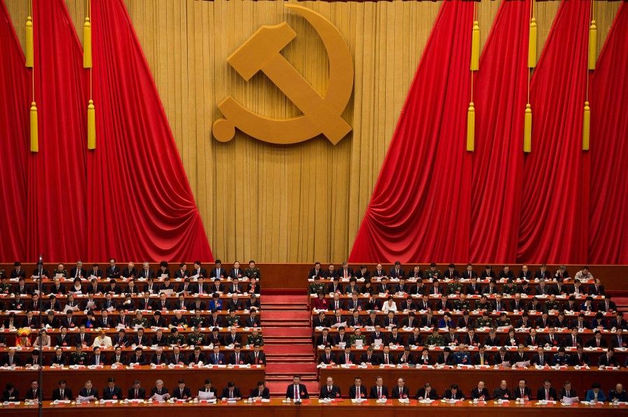 In this file photo taken on 24 October 2017, a general view shows delegates attending the closing of the 19th Communist Party Congress at the Great Hall of the People in Beijing. (Nicolas Asfouri/AFP)