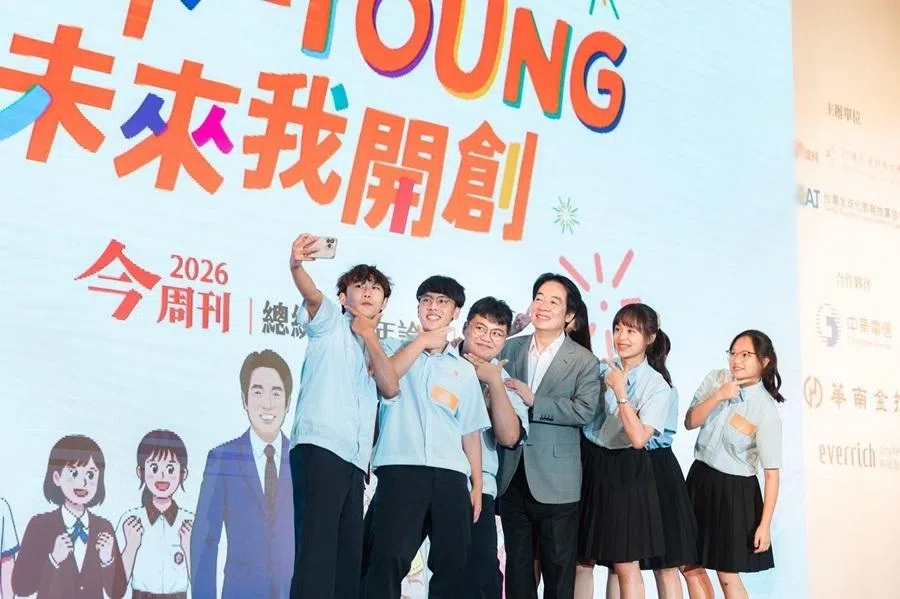 Taiwan President Lai Ching-te with students at a youth forum in May.