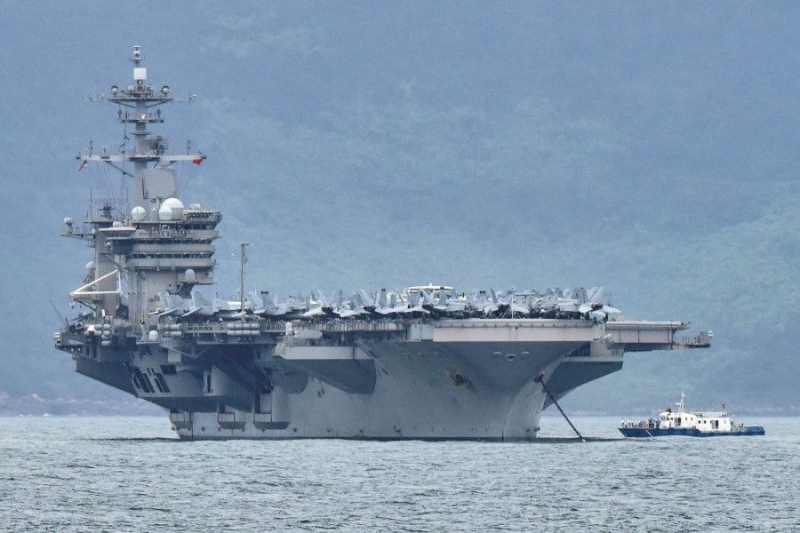 The USS Theodore Roosevelt (CVN-71) is pictured as it enters the port in Da Nang, Vietnam, 5 March 2020. (Kham/Reuters)