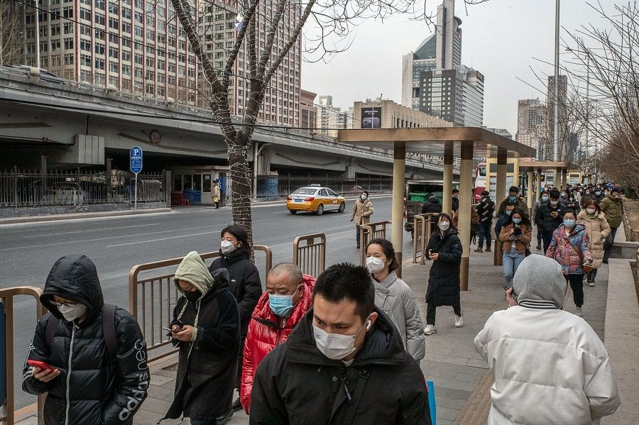 Pedestrians in Beijing, China, on 3 February 2023. (Bloomberg)