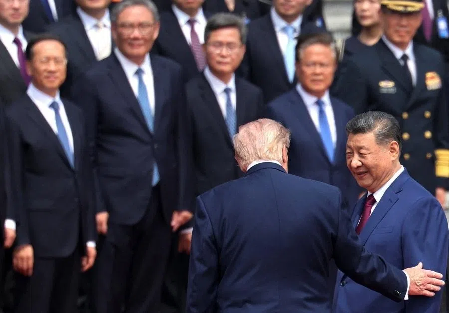 Chinese President Xi Jinping and US President Donald Trump attend a welcome ceremony at the Great Hall of the People in Beijing, China, on 14 May 2026. (Maxim Shemetov/Pool/Reuters)