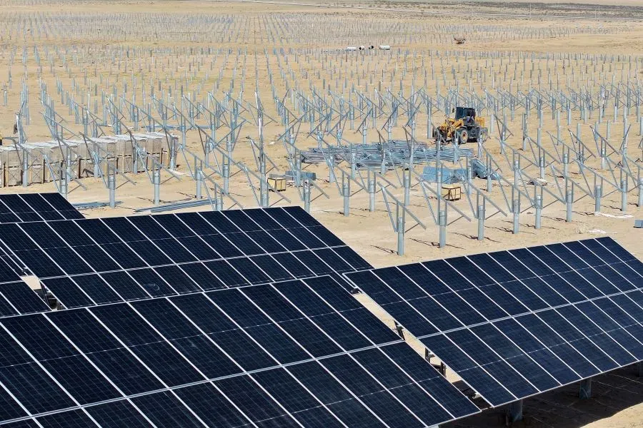 Structures being prepared for solar panel installation are seen at the Ningguoyun Lingwu 1 million kilowatt photovoltaic project in the desert at Lingwu, in China’s northern Ningxia region on 14 April 2025. (AFP)