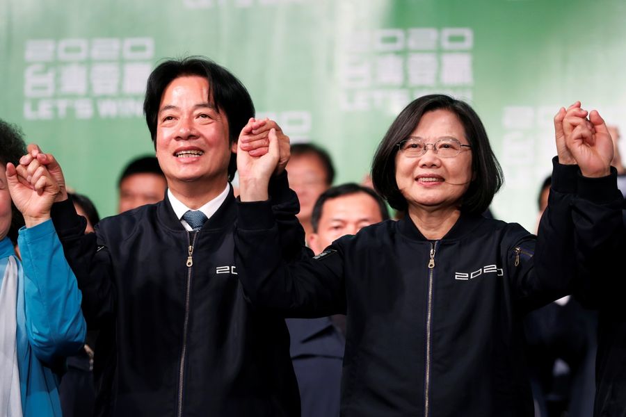 Taiwan Vice President-elect William Lai and incumbent Taiwan President Tsai Ing-wen celebrate at a rally after their election victory, outside the Democratic Progressive Party (DPP) headquarters in Taipei on 11 January 2020. (Tyrone Siu/Reuters)