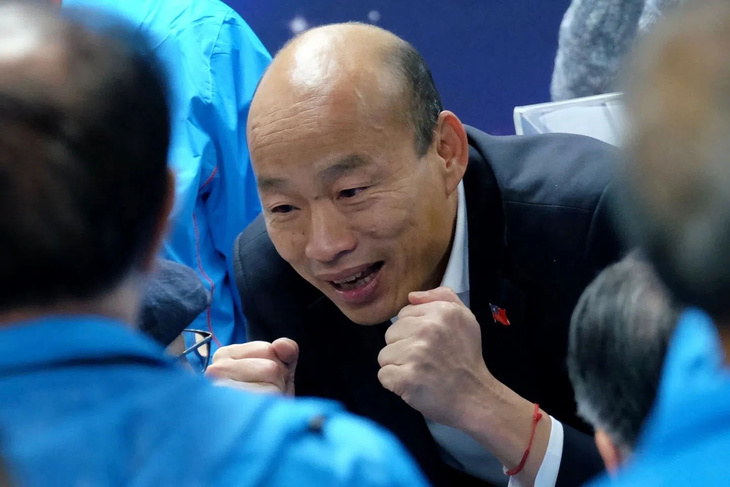 Han Kuo-yu gestures as he is greeted by supporters during his election campaign in Taipei on 25 December 2019. (Sam Yeh/AFP)