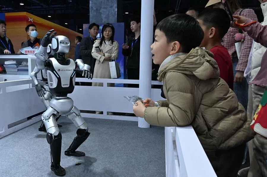 Robots from Leju Robot company are on display during the Beijing Sci-Fi Carnival in Beijing on 28 March 2026.