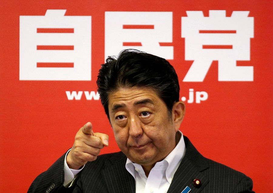 Japan Prime Minister and leader of the ruling Liberal Democratic Party (LDP) Shinzo Abe attends a news conference following a victory in the upper house elections by his ruling coalition, at the LDP headquarters in Tokyo, Japan, 11 July 2016. (Toru Hanai/File Photo/Reuters)