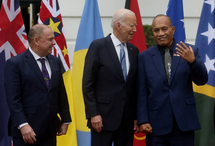 US President Joe Biden chats with President of Kiribati Taneti Maamau as Prime Minister of the Cook Islands Mark Brown stands next to them during a summit at the White House in Washington, US, on 25 September 2023. (Leah Millis/Reuters)