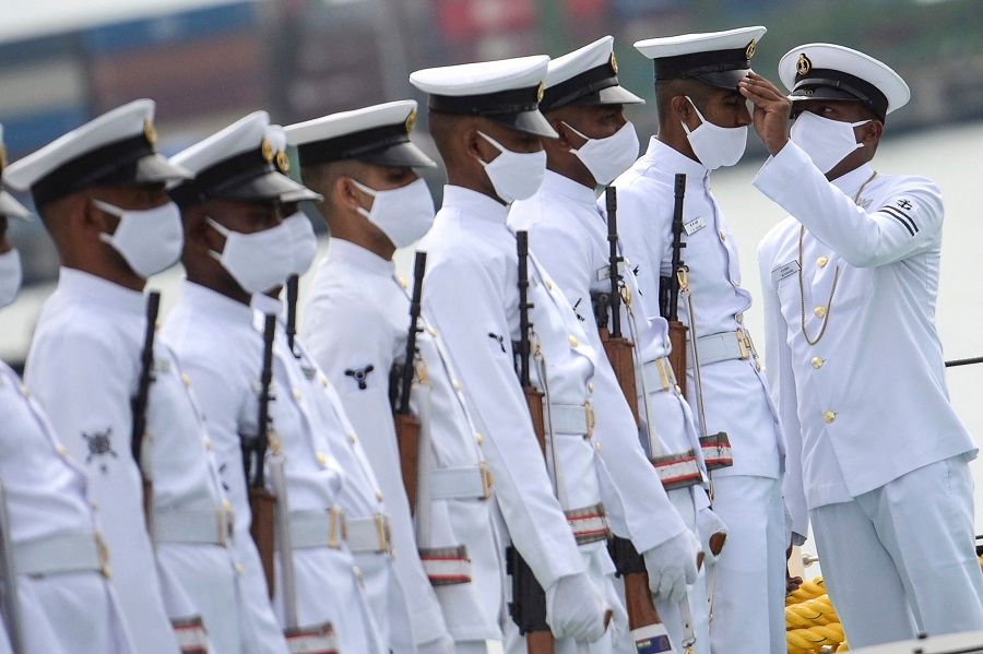 Coast guard cadets stand in formation as they prepare for the commissioning ceremony of the Indian Coast Guard offshore patrol vessel 'VIGRAHA' in Chennai, India, on 28 August 2021. (Arun Sankar/AFP)