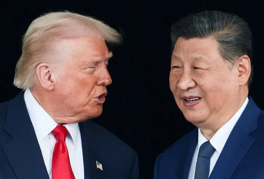 US President Donald Trump and Chinese President Xi Jinping talk as they leave after a bilateral meeting at Gimhae International Airport, on the sidelines of the Asia-Pacific Economic Cooperation (APEC) summit, in Busan, South Korea, on 30 October 2025. (Evelyn Hockstein/Reuters)