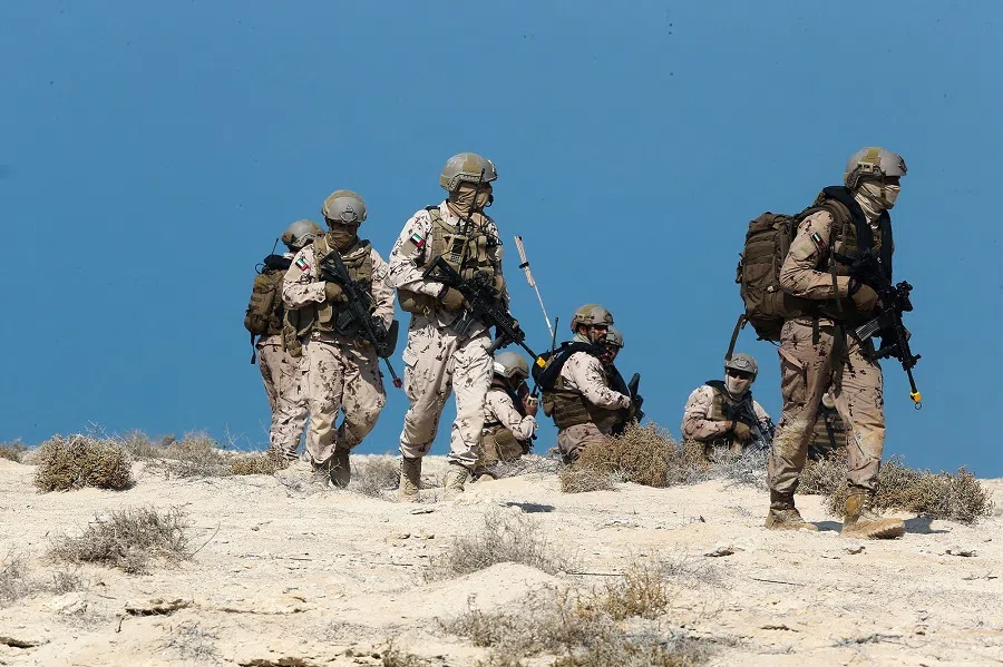 UAE Armed Forces perform the joint Emirates Shield/50 military drill west of the Maritime Theatre in Abu Dhabi, United Arab Emirates, 11 January 2022. (Satish Kumar/Reuters)