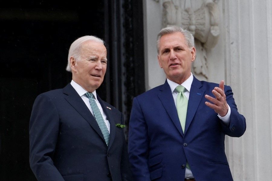 US President Joe Biden (left) with House Speaker Kevin McCarthy (right) as they depart following the annual Friends of Ireland luncheon at the US Capitol in Washington, US, 17 March 2023. (Evelyn Hockstein/Reuters)