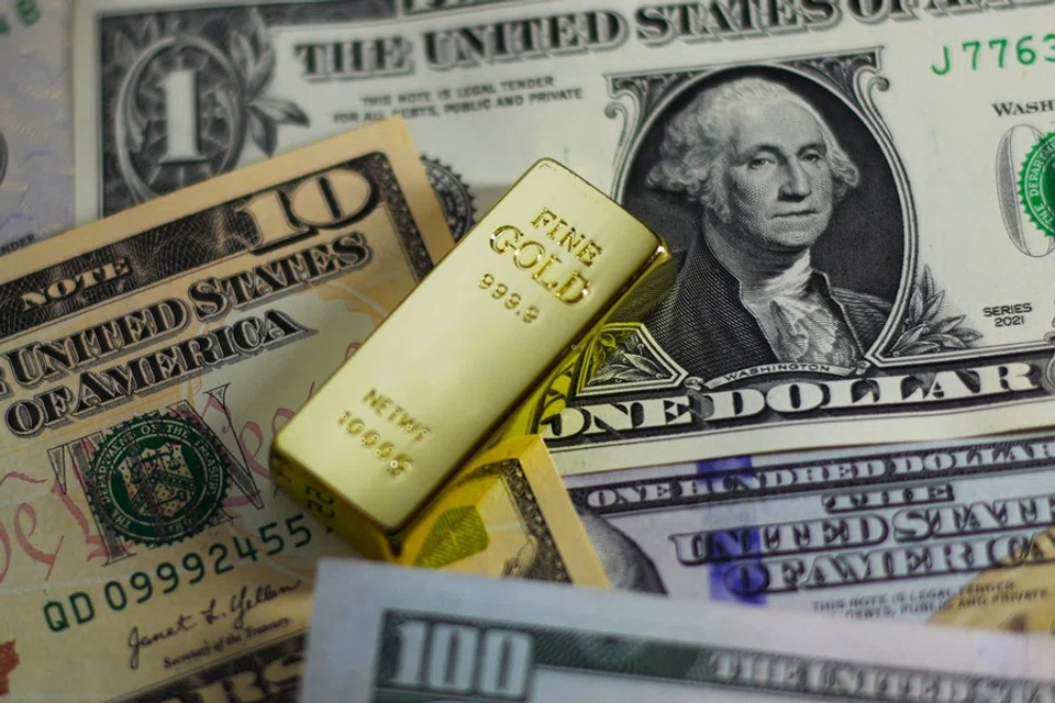 Amid a weakening US dollar, gold prices are skyrocketing. (SPH Media)