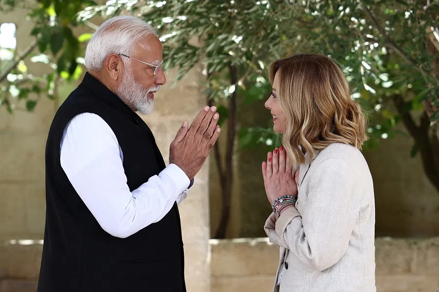 India’s Prime Minister Narendra Modi is welcomed by Italian Prime Minister Giorgia Meloni on the second day of the G7 summit, at the Borgo Egnazia resort, in Savelletri, Italy, on 14 June 2024. (Guglielmo Mangiapane/Reuters)