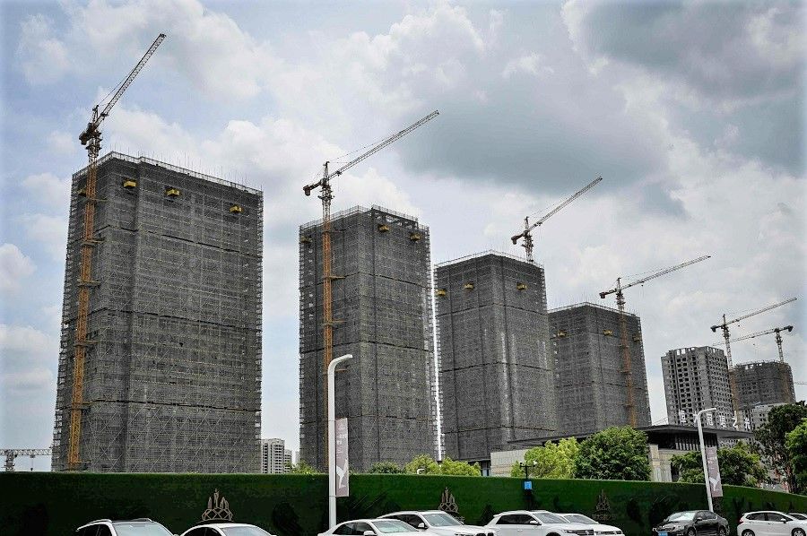 A general view shows Evergrande residential buildings under construction in Guangzhou, Guangdong province, China, 18 July 2022. (Jade Gao/AFP)
