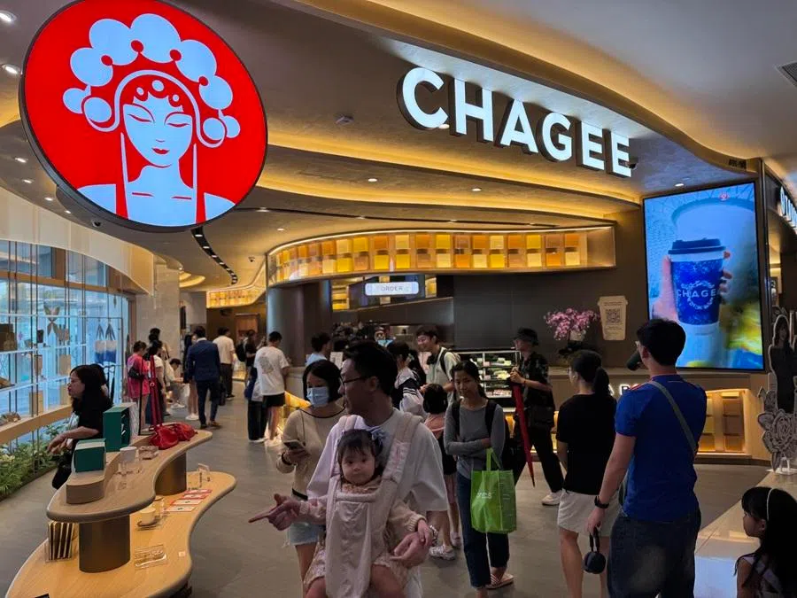 People queue for bubble tea at ChaGee's newly opened outlet in VivoCity in Singapore, on 26 January 2025.