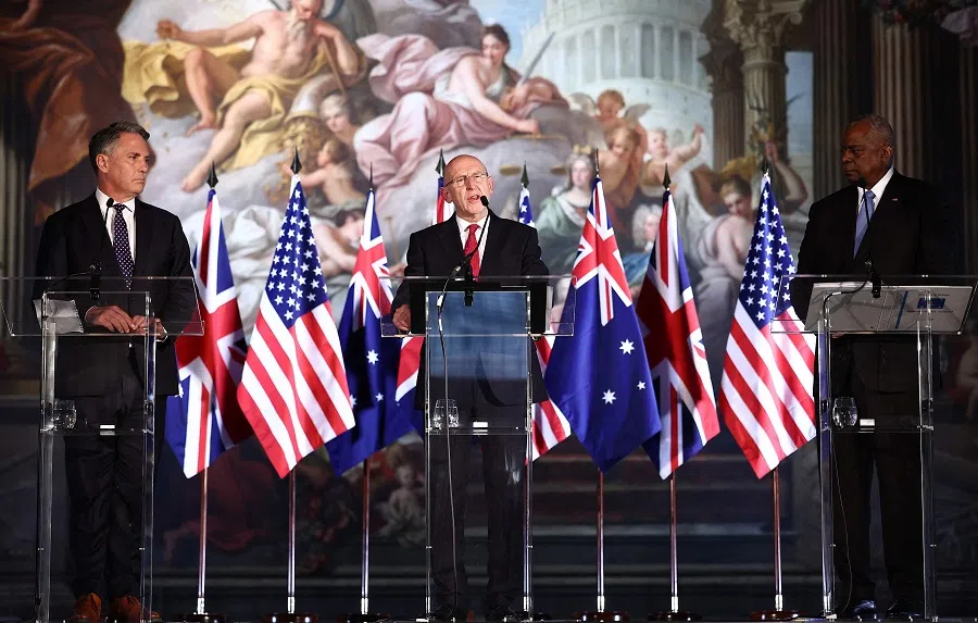 Britain’s Defence Secretary John Healey (C) speaks slongside Australian Defence Minister Richard Marles (L) and US Defence Secretary Lloyd Austin (R) during a joint press conference during the AUKUS Defense Ministerial Meeting in London on 26 September 2024. (Henry Nicholls/AFP)