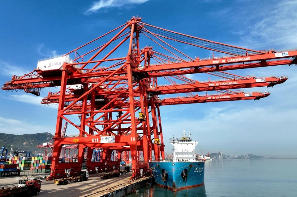 A cargo ship berths at Lianyungang port, in Jiangsu province, China, on 9 May 2023. (AFP)