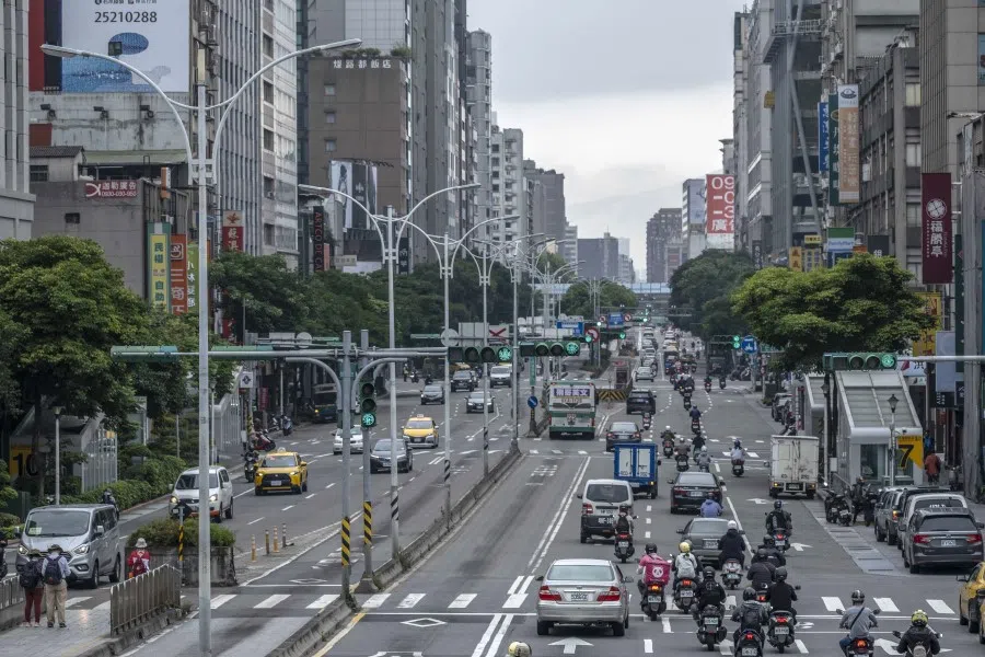 Vehicles travel along a road in Taipei, Taiwan, on 24 May 2022. (Lam Yik Fei/Bloomberg)