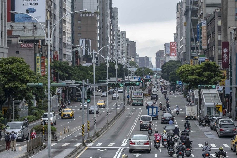 Vehicles travel along a road in Taipei, Taiwan, on 24 May 2022. (Lam Yik Fei/Bloomberg)