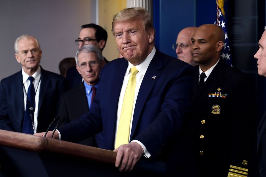 In this file photo, US President Donald Trump speaks about the Covid-19 pandemic alongside members of the Coronavirus Task Force in the Brady Press Briefing Room at the White House in Washington, D.C., on 9 March 2020. (Olivier Douliery/AFP)