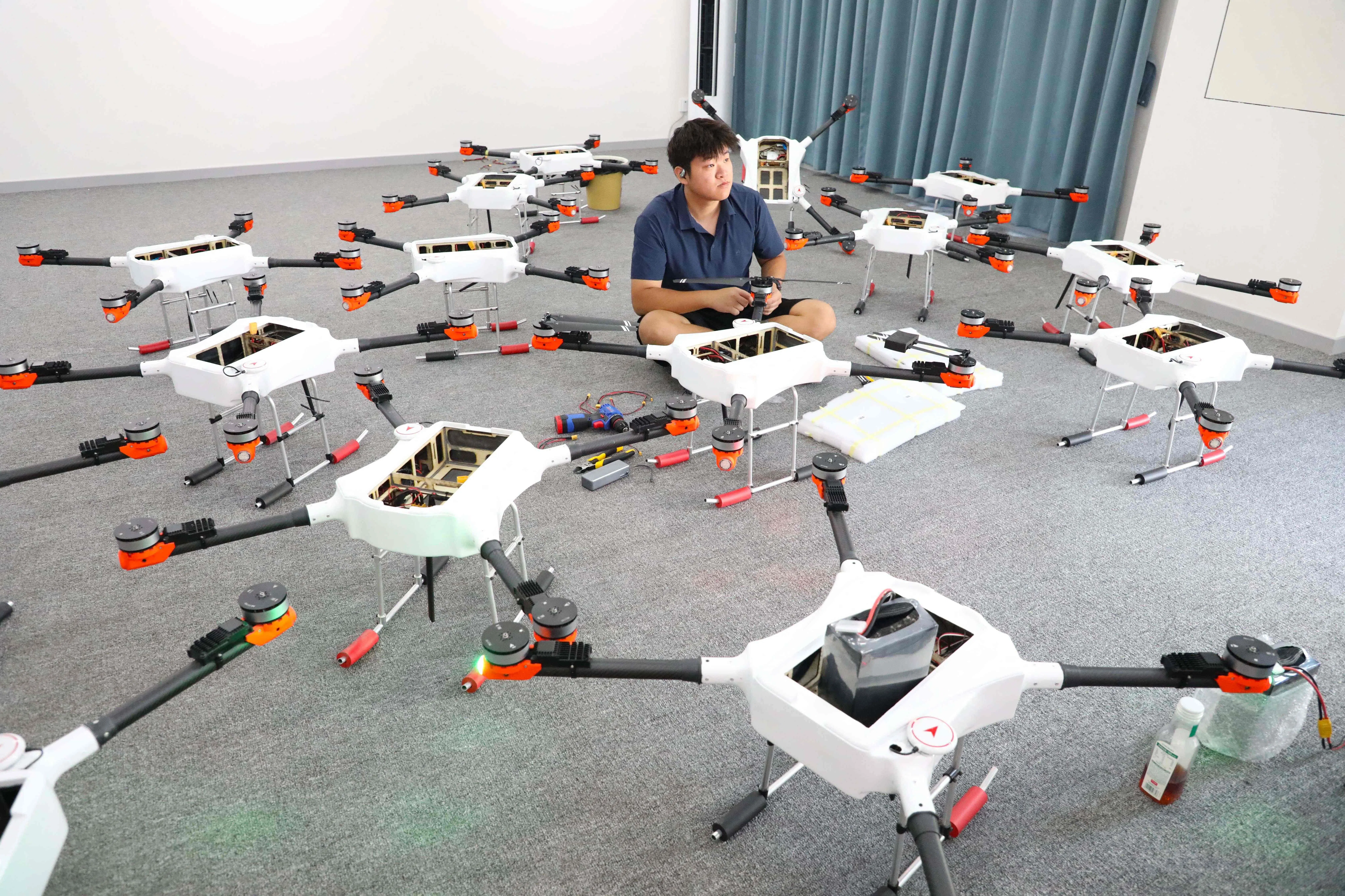 A technician assembles drones at a company in the Liangping High-tech Zone, a pilot zone intended to develop China’s low-altitude economy, in Chongqing, in southwest China, on 8 September 2026.
