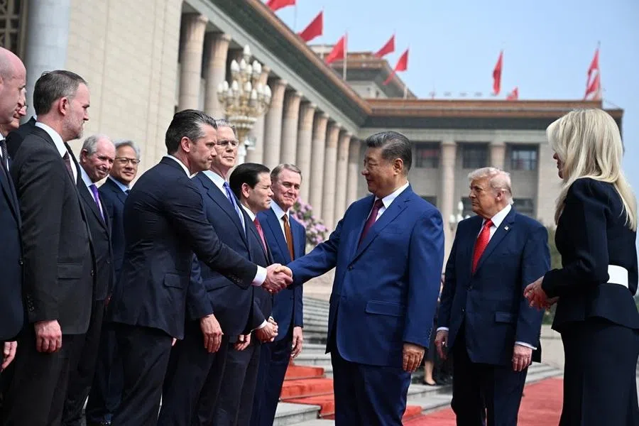 Chinese President Xi Jinping shaking hands with US Secretary of Defense Pete Hegseth at the Great Hall of the People, 14 May 2026, in Beijing, China.