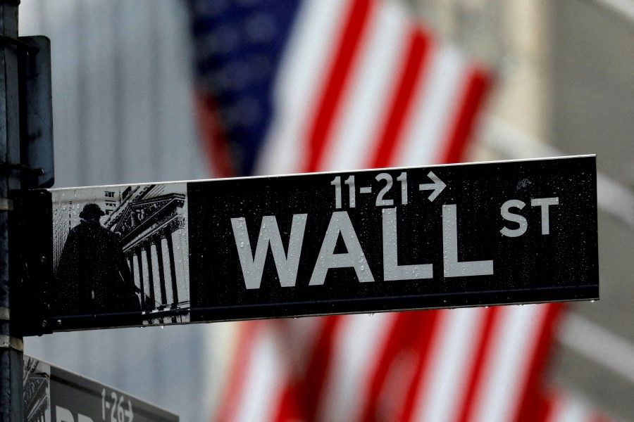 A sign for Wall Street outside the New York Stock Exchange in Manhattan in New York City, New York, U.S., 26 October 2020. (Mike Segar/Reuters)