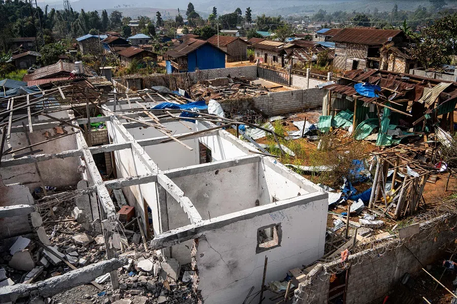 This photo taken on 4 February 2024 shows destroyed buildings and houses following fighting between Myanmar's Military and the Kachin Independence Army (KIA) in Nam Hpat Kar, Kutkai township in Myanmar's northern Shan State. (AFP)