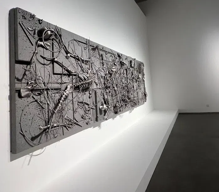 The Grey Sameness《灰的一样》, 2011. Grey flannel, silk thread, resin in shape of bones, copper, aluminum, wire, furfural. The Take A Step Back Collection.