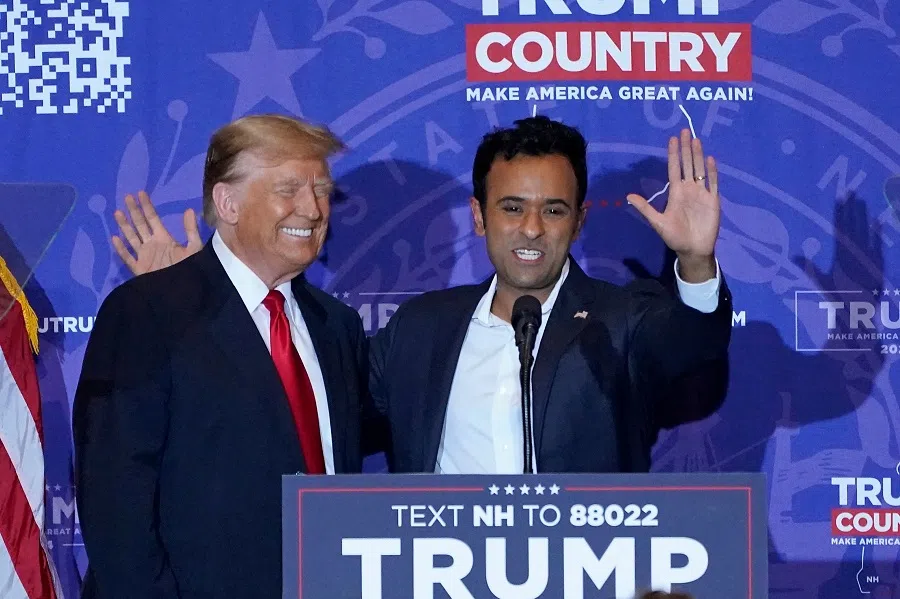 US entrepreneur Vivek Ramaswamy (right) endorses Republican presidential candidate former US President Donald Trump during a campaign event at the Atkinson Resort and Country Club in Atkinson, New Hampshire, on 16 January 2024. (Timothy A. Clary/AFP)