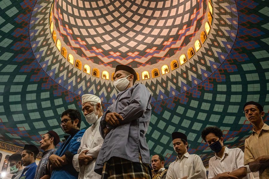 Indonesians perform lunar eclipse prayers at the Al-Akbar Mosque, in Surabaya, Indonesia, on 8 November 2022. (Juni Kriswanto/AFP)