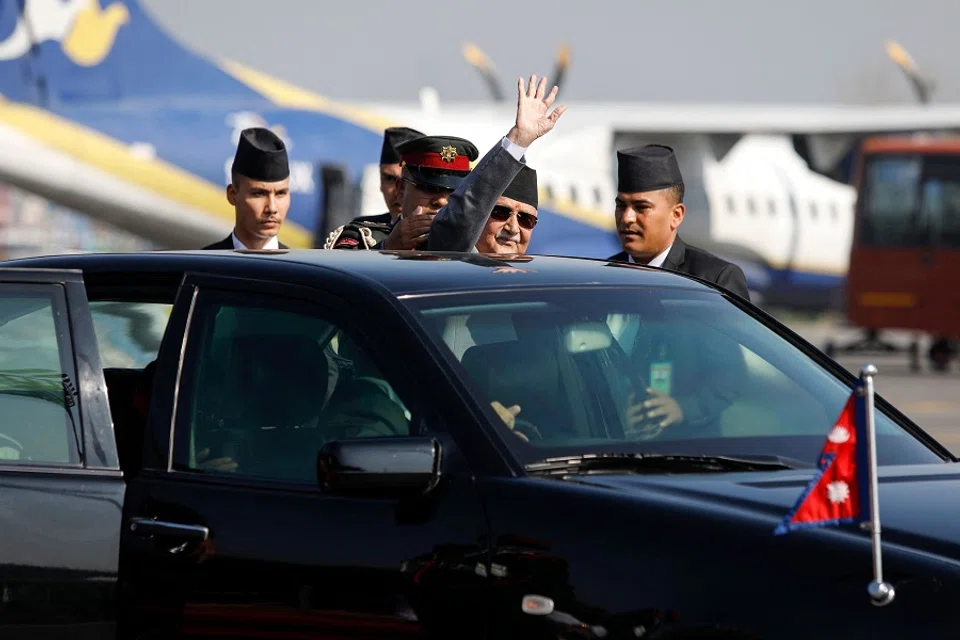 Nepal’s Prime Minister KP Sharma Oli (second from right) before his departure to China, at the Tribhuvan International airport in Kathmandu, Nepal, on 2 December 2024. (Aryan Dhimal/AFP)