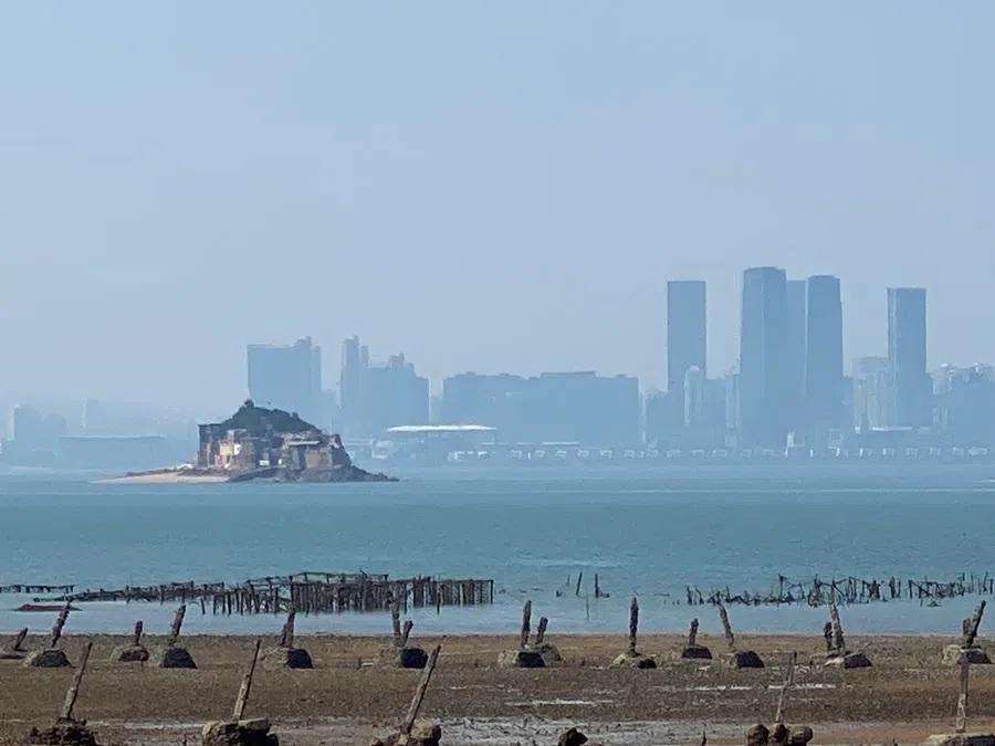 Anti-landing spikes lining the beaches of Kinmen, Taiwan, where the Chinese city of Xiamen in Fujian province can be seen in the distance. (SPH Media)