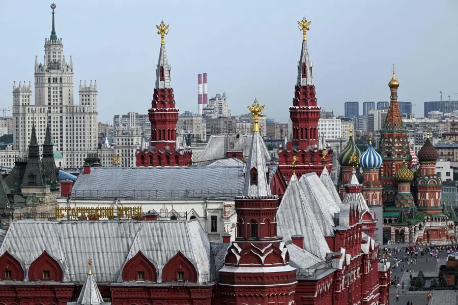A view shows the State Historical Museum (C), St Basil's Cathedral (R) and one of the Stalin-era skyscrapers in downtown Moscow on 11 July 2022. (Kirill Kudryavtsev/AFP)