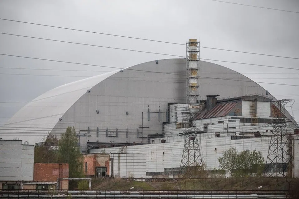 The New Safe Confinement (NSC) structure covers the old sarcophagus, which confines the remains of the damaged fourth reactor, at the Chernobyl Nuclear Power Plant, amid Russia's attack on Ukraine, in Kyiv region, Ukraine, on 26 April 2026. (Alina Smutko/Reuters)