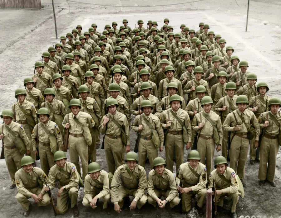 14 August 1944, Kunming, Yunnan - All of the USAAF's 14th Air Force are posing for a group photograph in full uniform at their training base in Kunming, Yunnan.