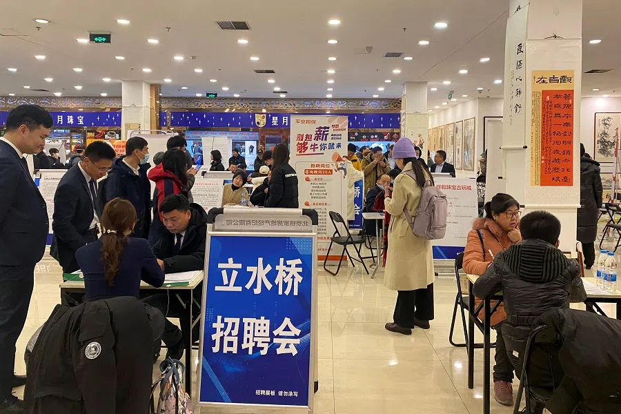 People attend a job fair following the Lunar New Year holiday, in Beijing, China, 23 February 2024. (Ellen Zhang/Reuters)