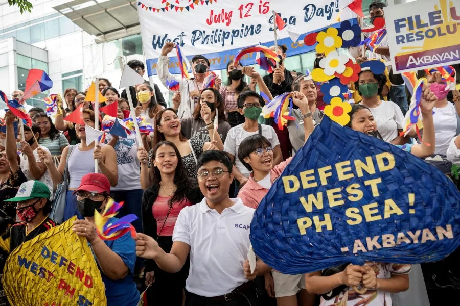 Filipino activists gather outside the Chinese consular office to commemorate the anniversary of the Philippines' victory against China in the UN arbitral ruling on the South China Sea, in Makati City, Metro Manila, Philippines, 12 July 2023. (Eloisa Lopez/Reuters)